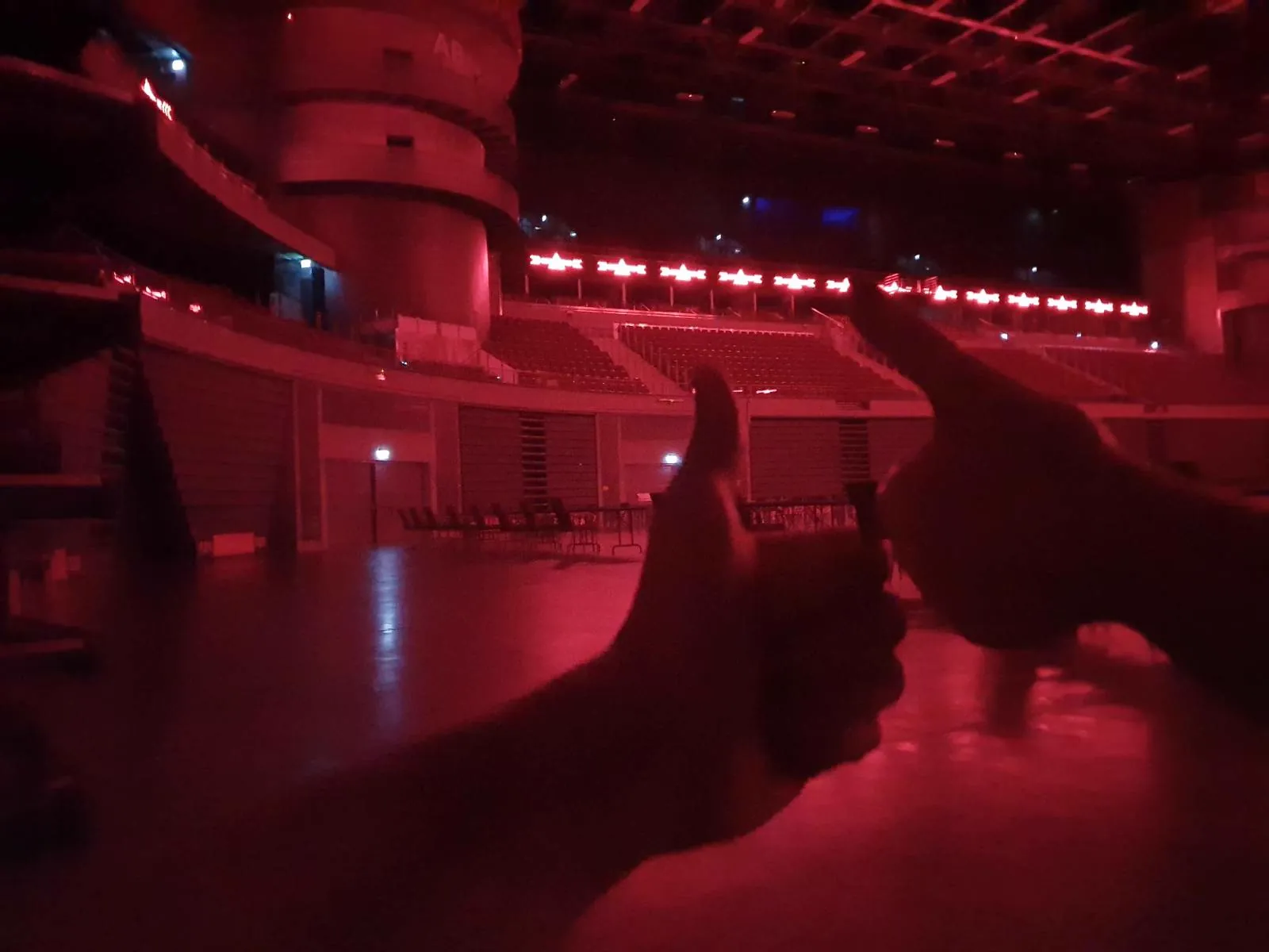 Event venue with atmospheric red lighting